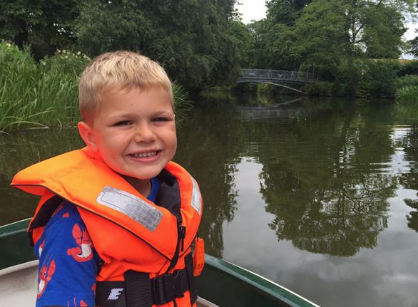 He's car and sport mad and nothing makes him happier than football, golf and swimming like a fish.